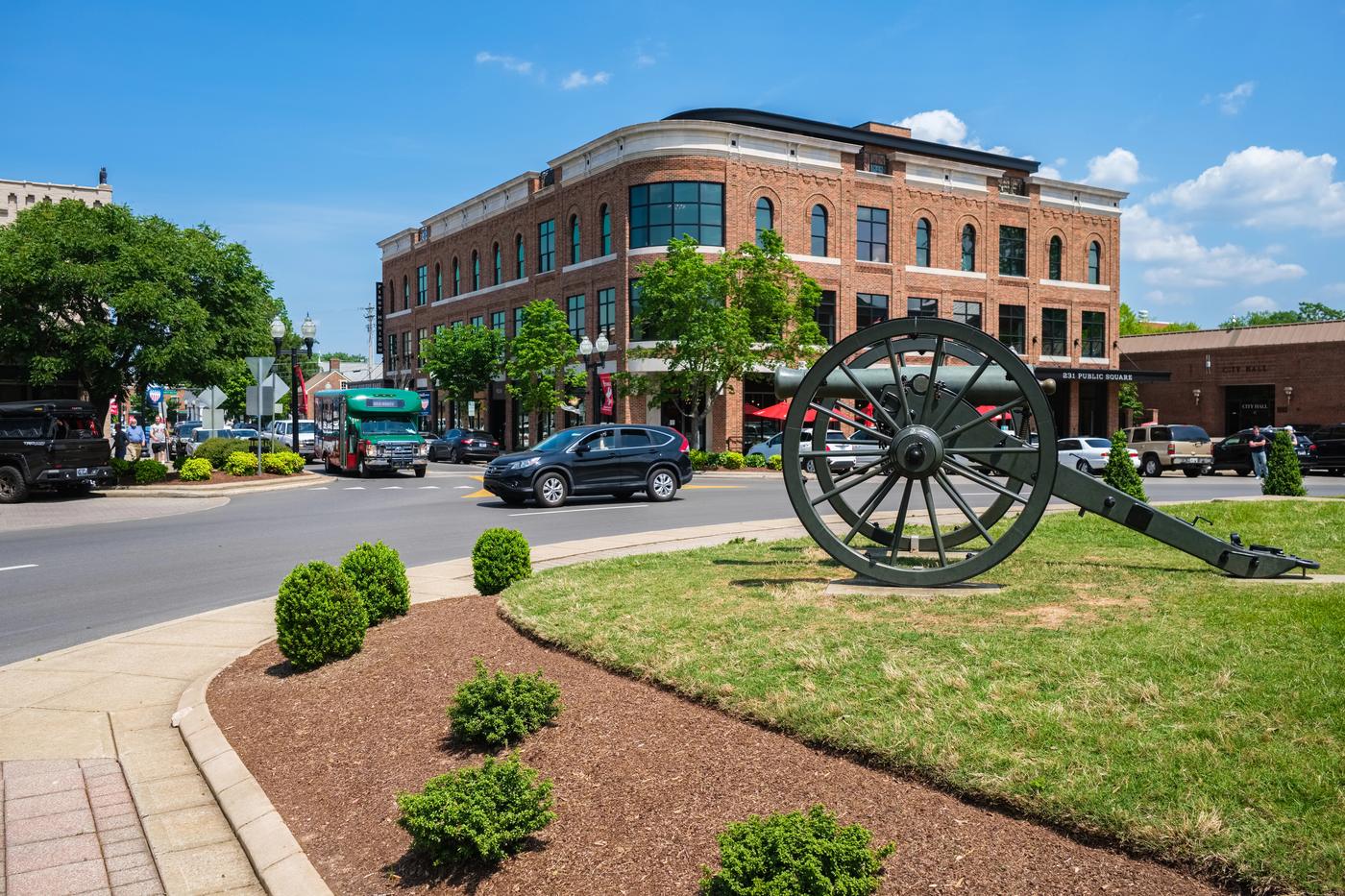Downtown Franklin, Tennessee's Public Square, with the Civil War monument, City Hall, and historic brick storefronts along the business district Schneidman Law serves